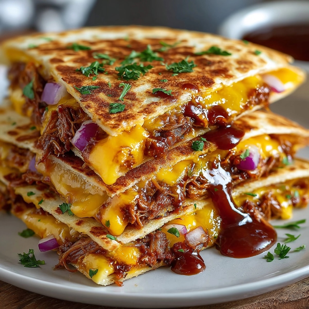 BBQ Pulled Pork Quesadillas: Golden grilled tortillas overflowing with juicy, smoky pulled pork.
