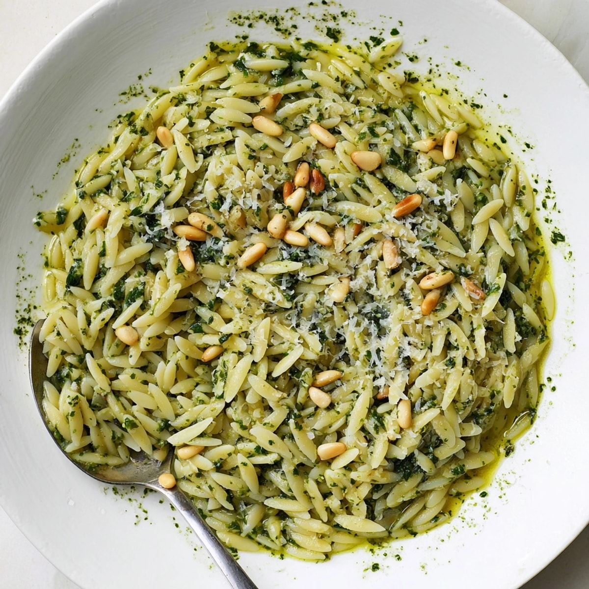 Delicious vegetarian Spinach Pesto Orzo recipe: a vibrant and flavorful pasta salad.