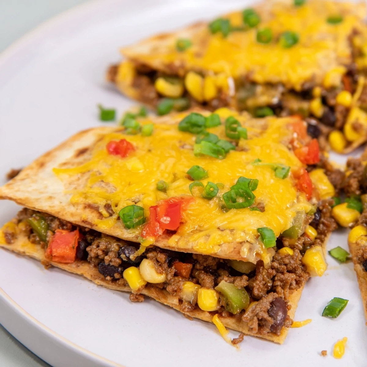 Enjoy these flavorful sheet pan quesadillas with beef, packed with savory fillings and perfect for sharing.