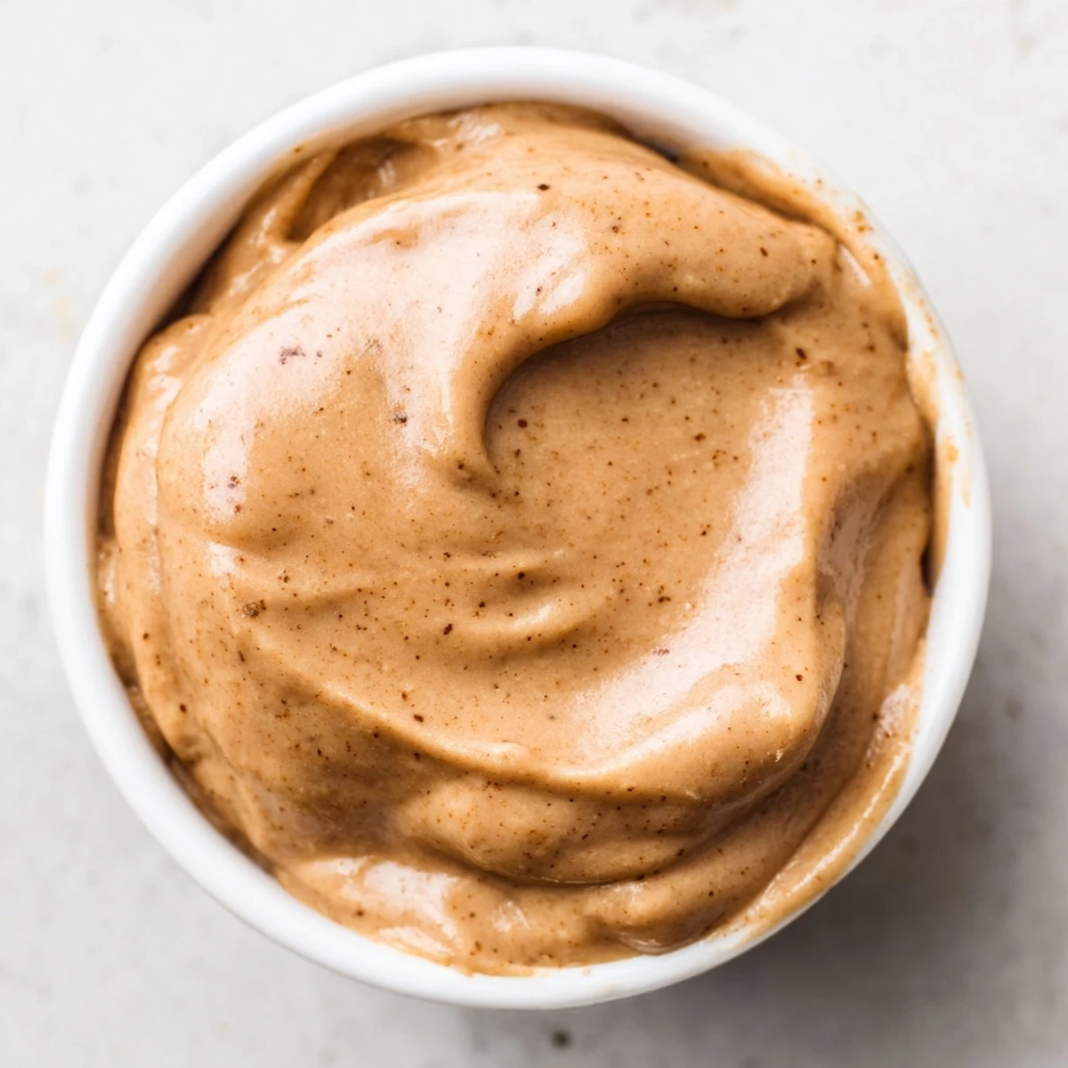 Quick Christmas Cookie Butter Spread swirled beautifully, ready to be spread on toast with extra spice.
