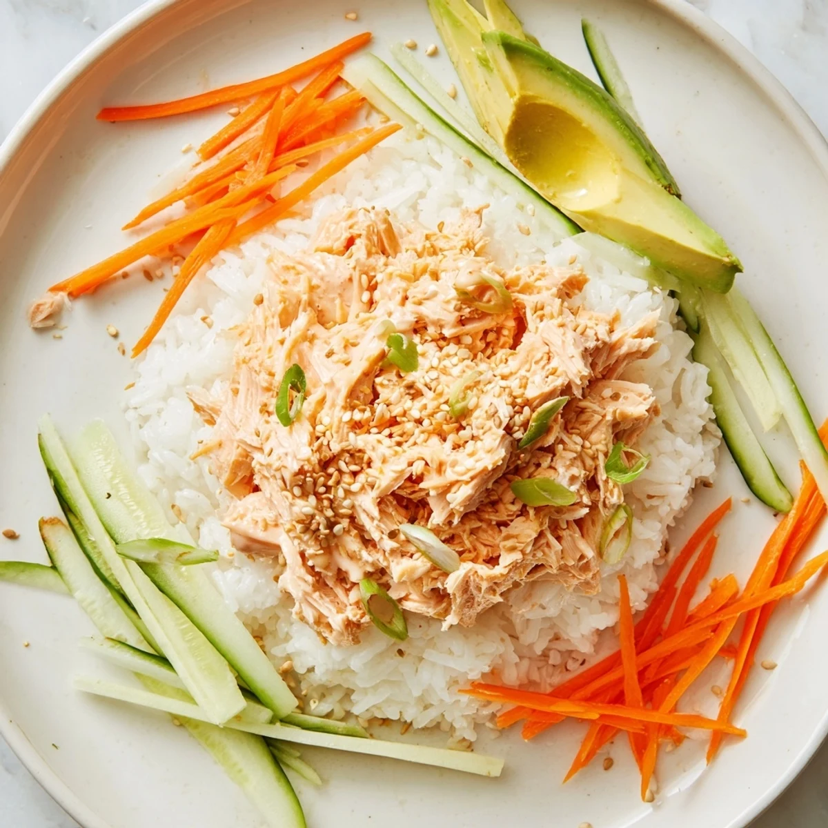 Steaming Spicy Canned Salmon Rice Bowl brimming with colorful veggies, ready for a satisfying, spicy bite.