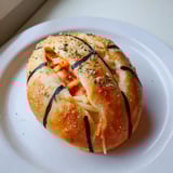 Warm, bite-sized Slam Dunk Basketball Pizza Bites with perfect basketball lines, ideal for a game.