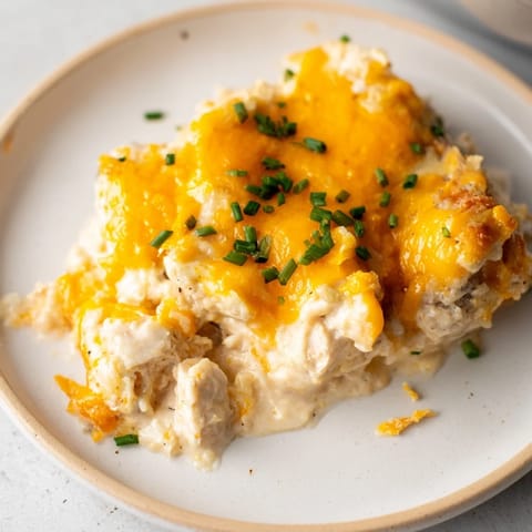 This creamy and cheesy Cheddar Ranch Chicken Bake is shown, with a perfectly browned crust.
