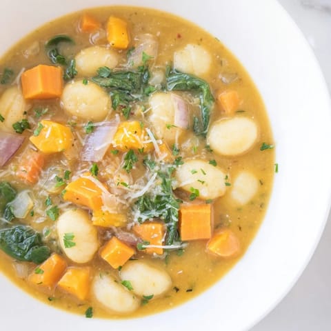 Cozy and vibrant, this Savory Butternut Squash Gnocchi Soup showcases tender squash and soft gnocchi.
