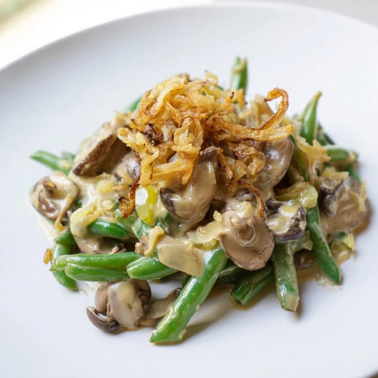 This creamy Old-School Green Bean Casserole features tender green beans in a rich mushroom and onion sauce.