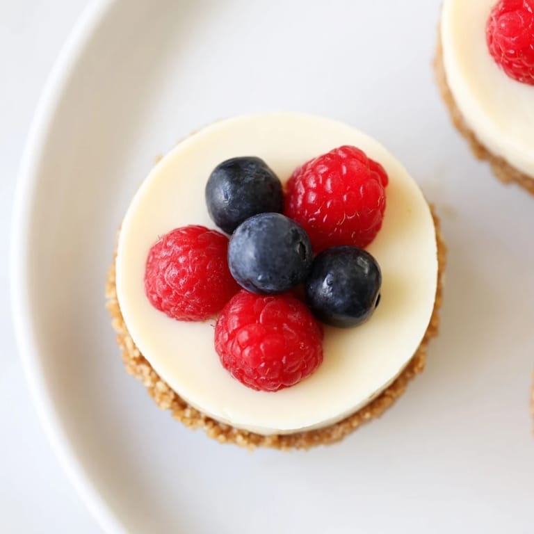 Delectable Mini Dessert Bites Trio, with chilled cheesecake and chocolate tarts, perfect sweet treats for sharing.
