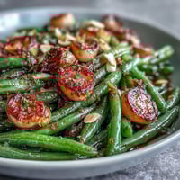 Roasted Garlic Green Beans with Lemon Zest, golden and tender, perfect for a savory Easter side dish.  